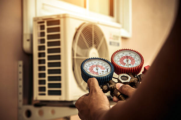 Professional Air Conditioning Service technician working in Jackson, LA